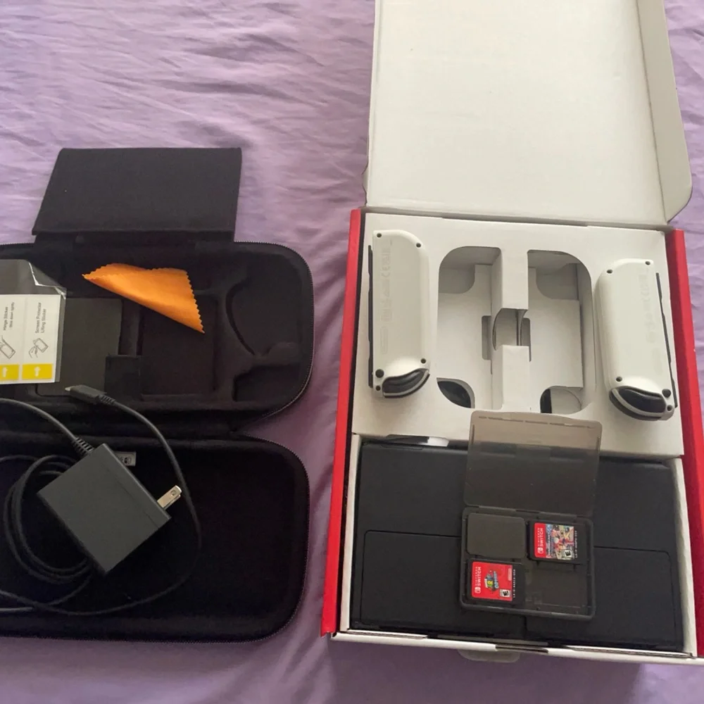 Nintendo Switch with Gray Joy-Con and Accessories